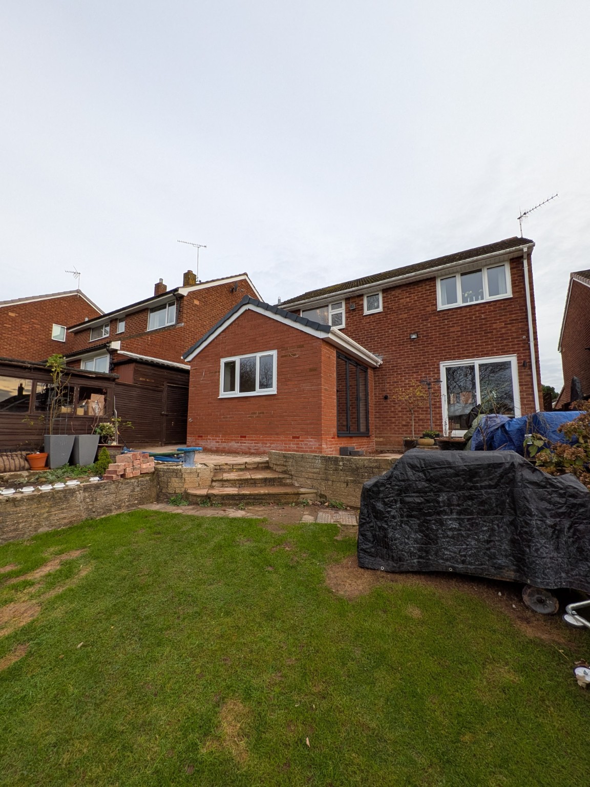 Completed single-storey brick extension in Coventry, exterior view