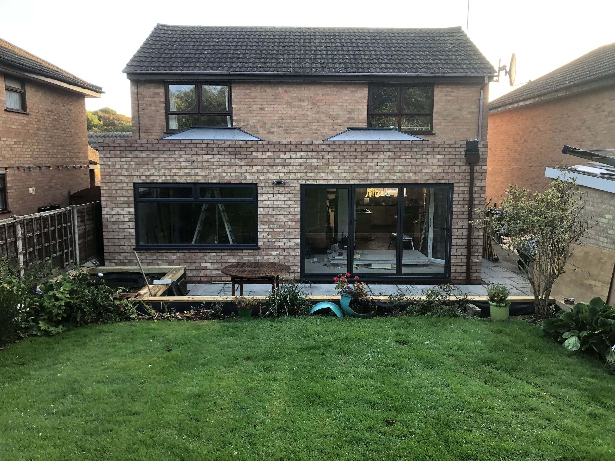 Completed modern brick single-storey rear extension
